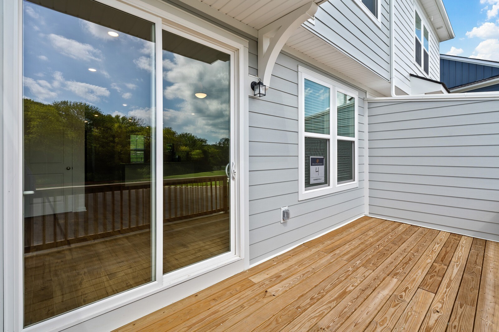 406 Blair Road Smyrna, TN 37167 - Photo 25 of 28 a view of a balcony with wooden floor and iron stairs