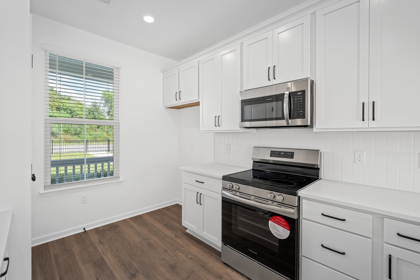 406 Blair Road Smyrna, TN 37167 - Photo 7 of 28 a kitchen with granite countertop cabinets stainless steel appliances and a window