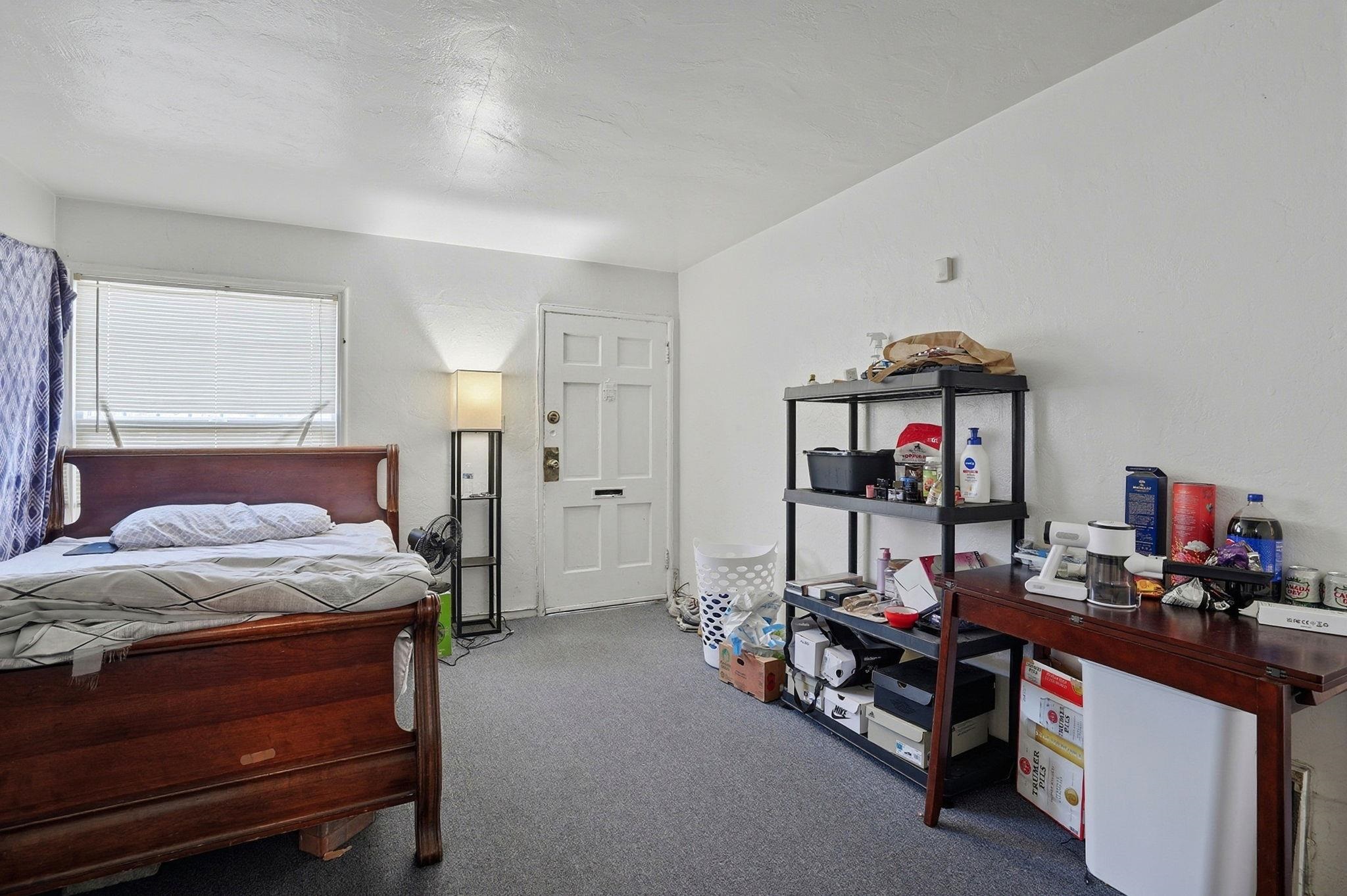 3224 Sacramento Street Berkeley, CA 94702 - Photo 12 of 21 a bed room with a bed and a desk