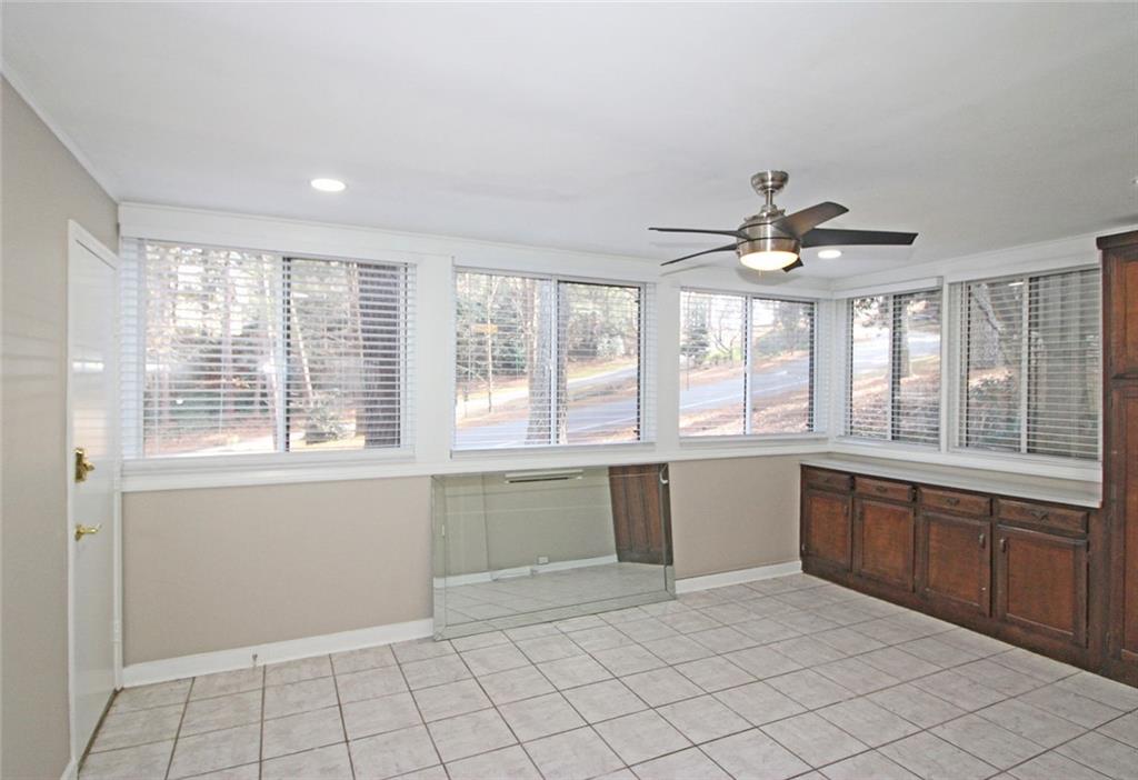 38 La Rue Place Northwest Atlanta, GA 30327 - Photo 15 of 78 a large white kitchen with a large window