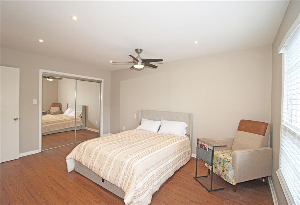 38 La Rue Place Northwest Atlanta, GA 30327 - Photo 21 of 78 a bedroom with a bed and window