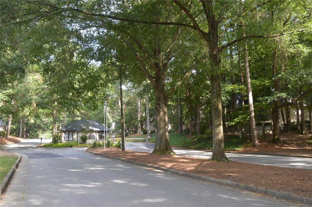 38 La Rue Place Northwest Atlanta, GA 30327 - Photo 38 of 78 a view of road with trees