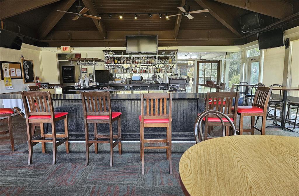 38 La Rue Place Northwest Atlanta, GA 30327 - Photo 46 of 78 a dinning area with pool table and chairs