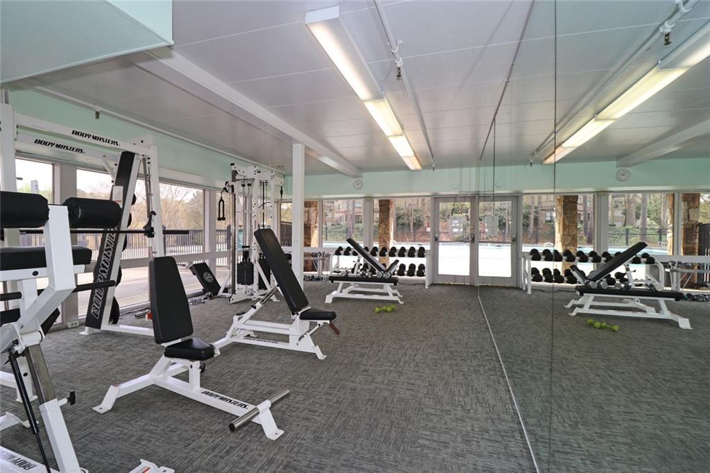 38 La Rue Place Northwest Atlanta, GA 30327 - Photo 73 of 78 a view of a room with gym equipment