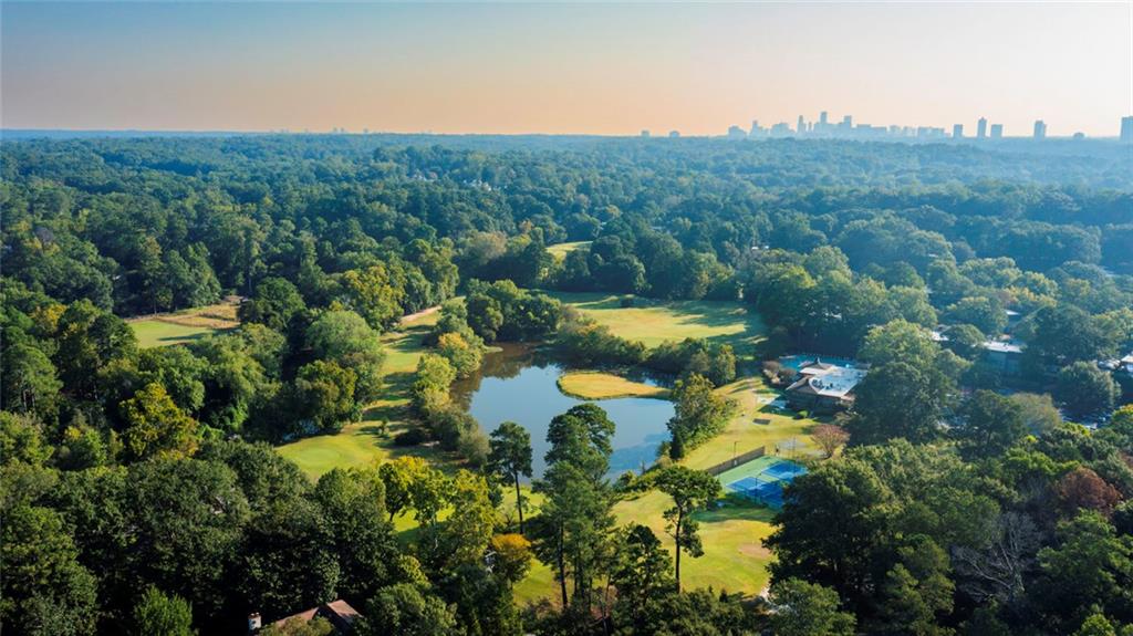 38 La Rue Place Northwest Atlanta, GA 30327 - Photo 75 of 78 a view of a lake with mountains in the background
