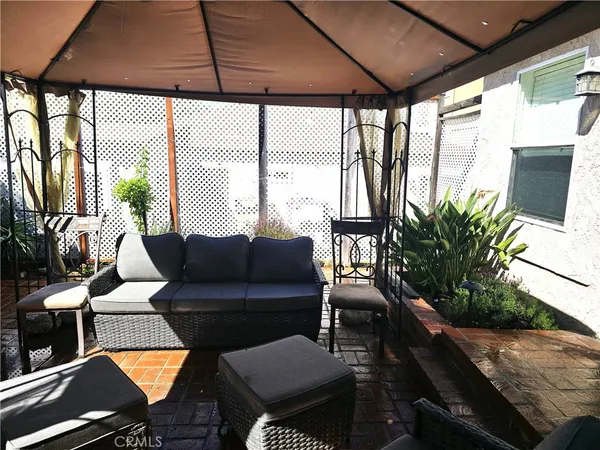 a building outdoor space with patio furniture