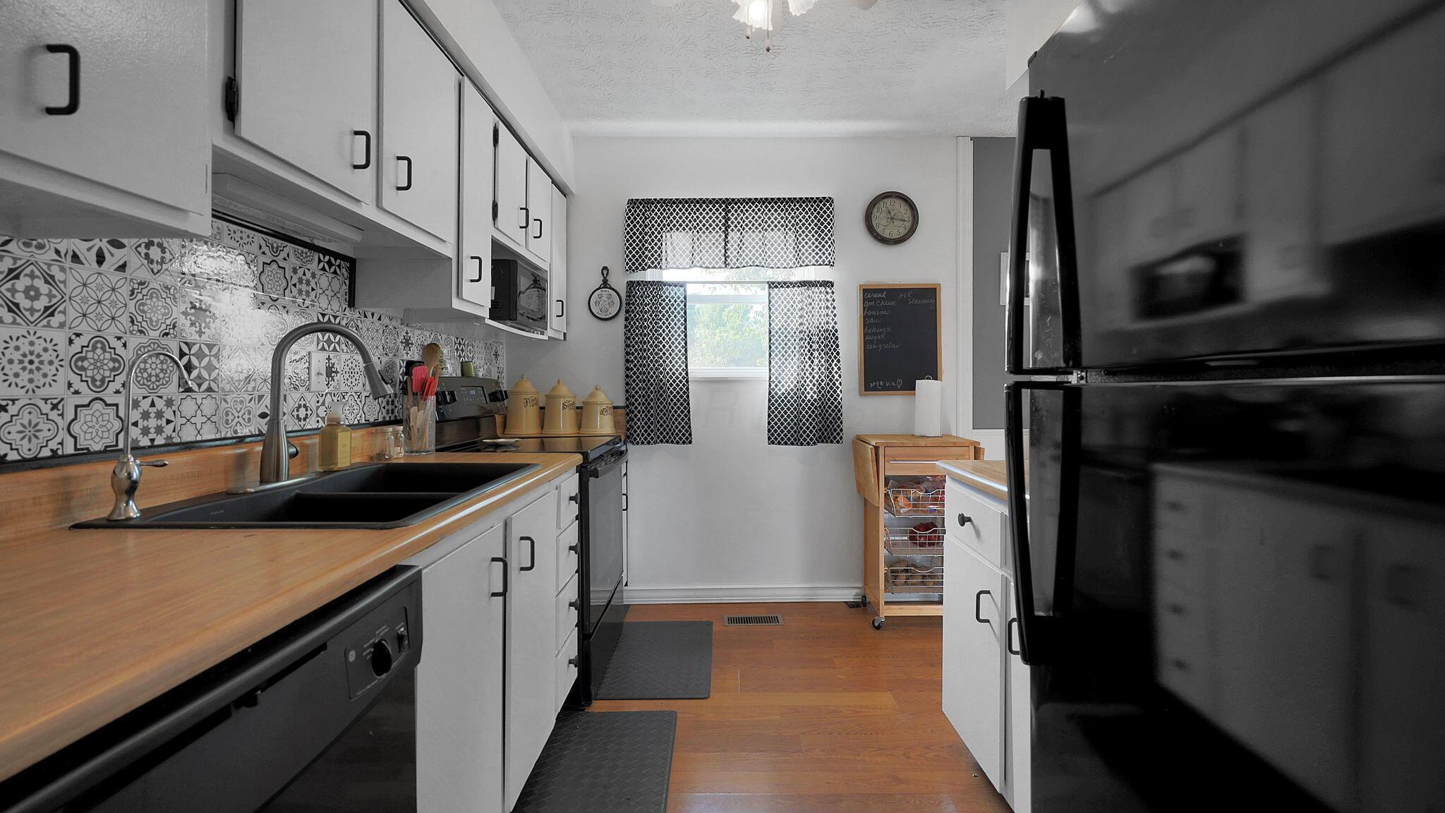 14221 Edwards Road Johnstown, OH 43031 - Photo 6 of 45 Kitchen: refridgerator, stove, and microwave are 2 years old. The dishwasher is 5 years old.