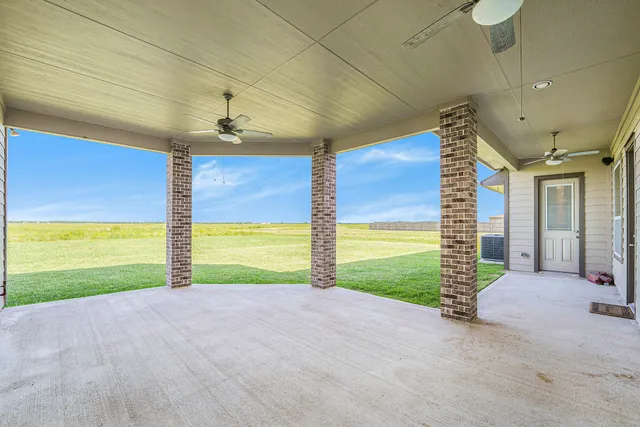 a view of a room with window and a yard
