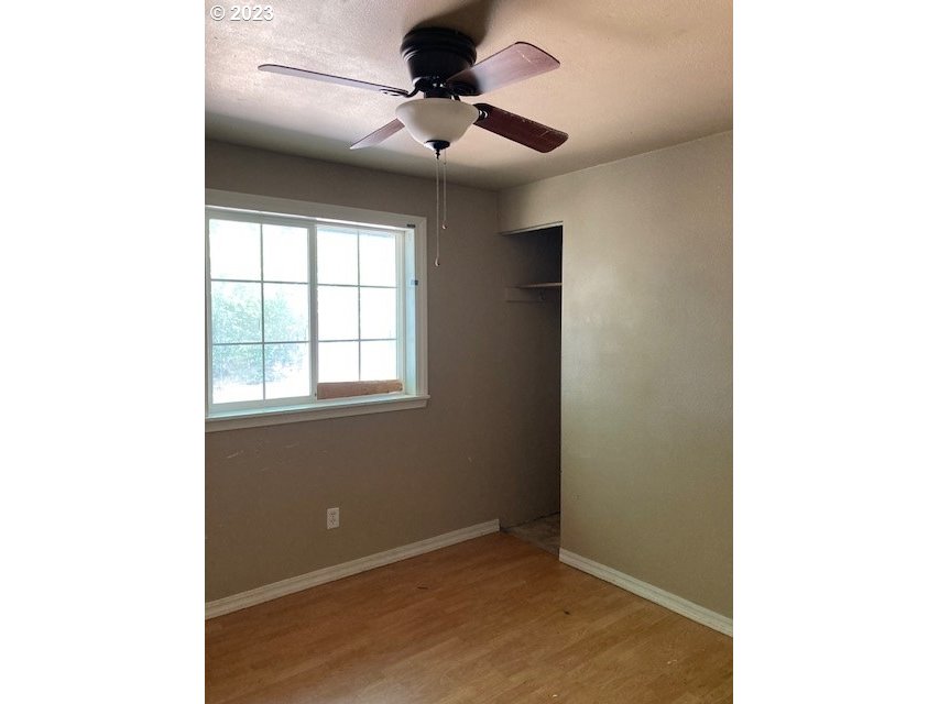 605 Southwest Nye Avenue Pendleton, OR 97801 - Photo 13 of 36 a view of an empty room with a window
