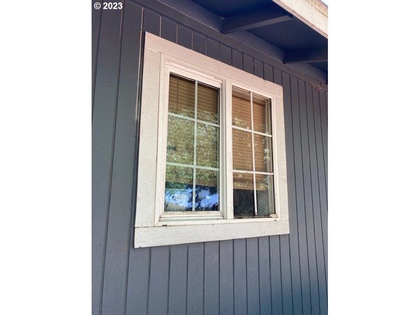 605 Southwest Nye Avenue Pendleton, OR 97801 - Photo 3 of 36 a view of a door and a window