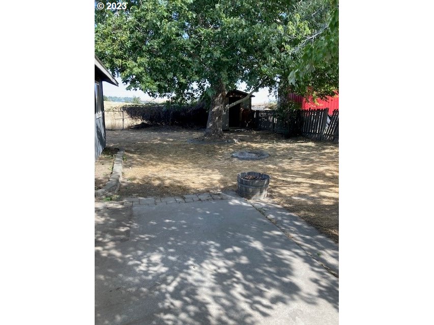 605 Southwest Nye Avenue Pendleton, OR 97801 - Photo 32 of 36 a view of a yard with trees