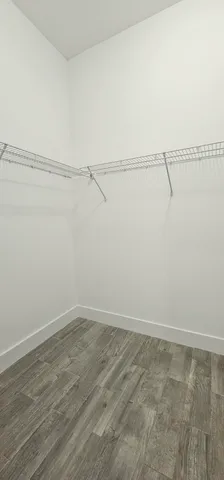a view of a room with racks on the wall