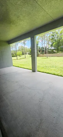 a view of a room with an outdoor space and balcony