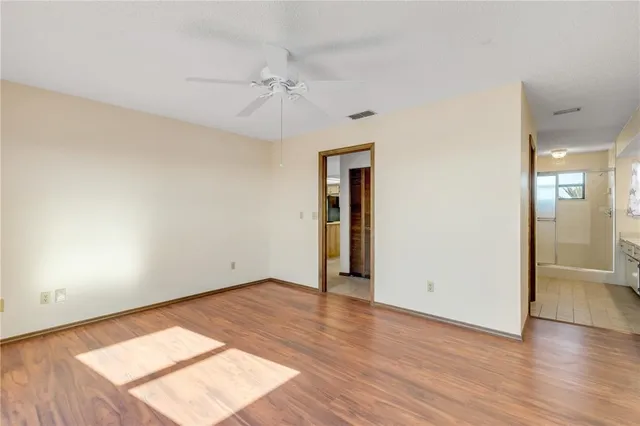 a kitchen with stainless steel appliances granite countertop a refrigerator stove and microwave