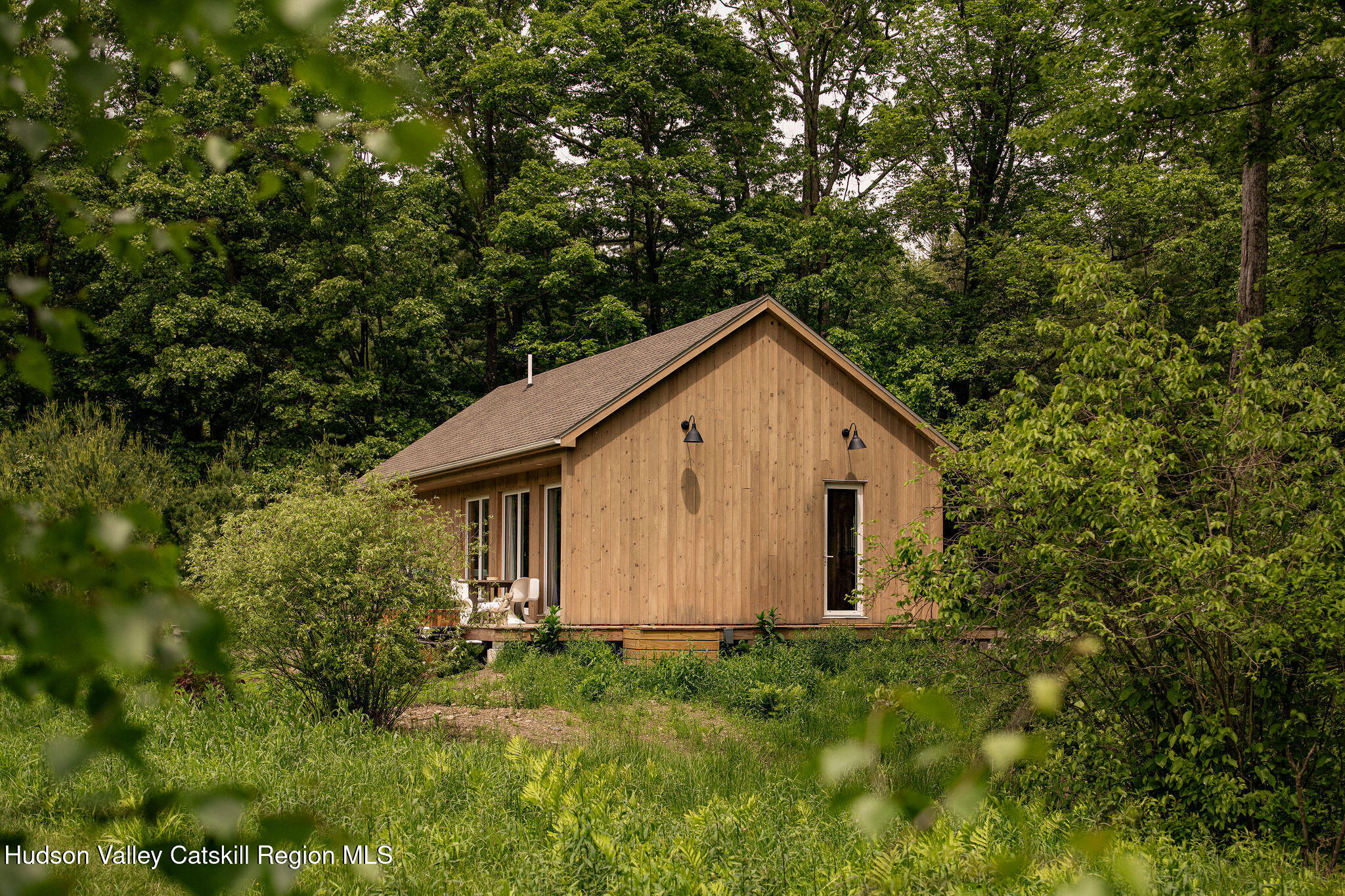 129 Krum Road Kerhonkson, NY 12446 - Photo 1 of 42 a view of house with backyard and garden