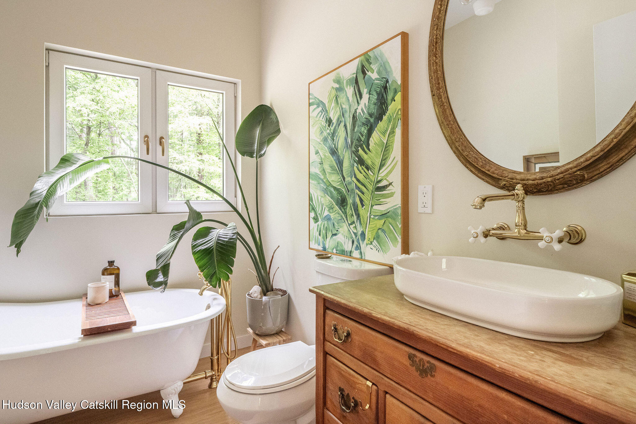 129 Krum Road Kerhonkson, NY 12446 - Photo 17 of 42 a bathroom with a toilet a sink and a mirror