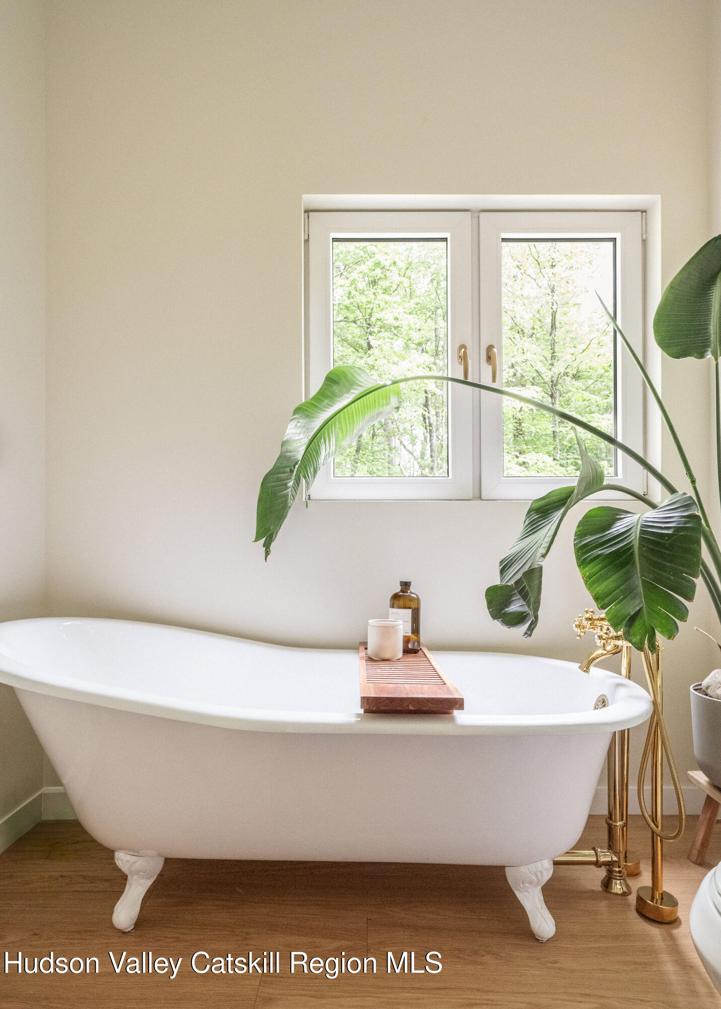 129 Krum Road Kerhonkson, NY 12446 - Photo 18 of 42 a white bath tub sitting next to a window