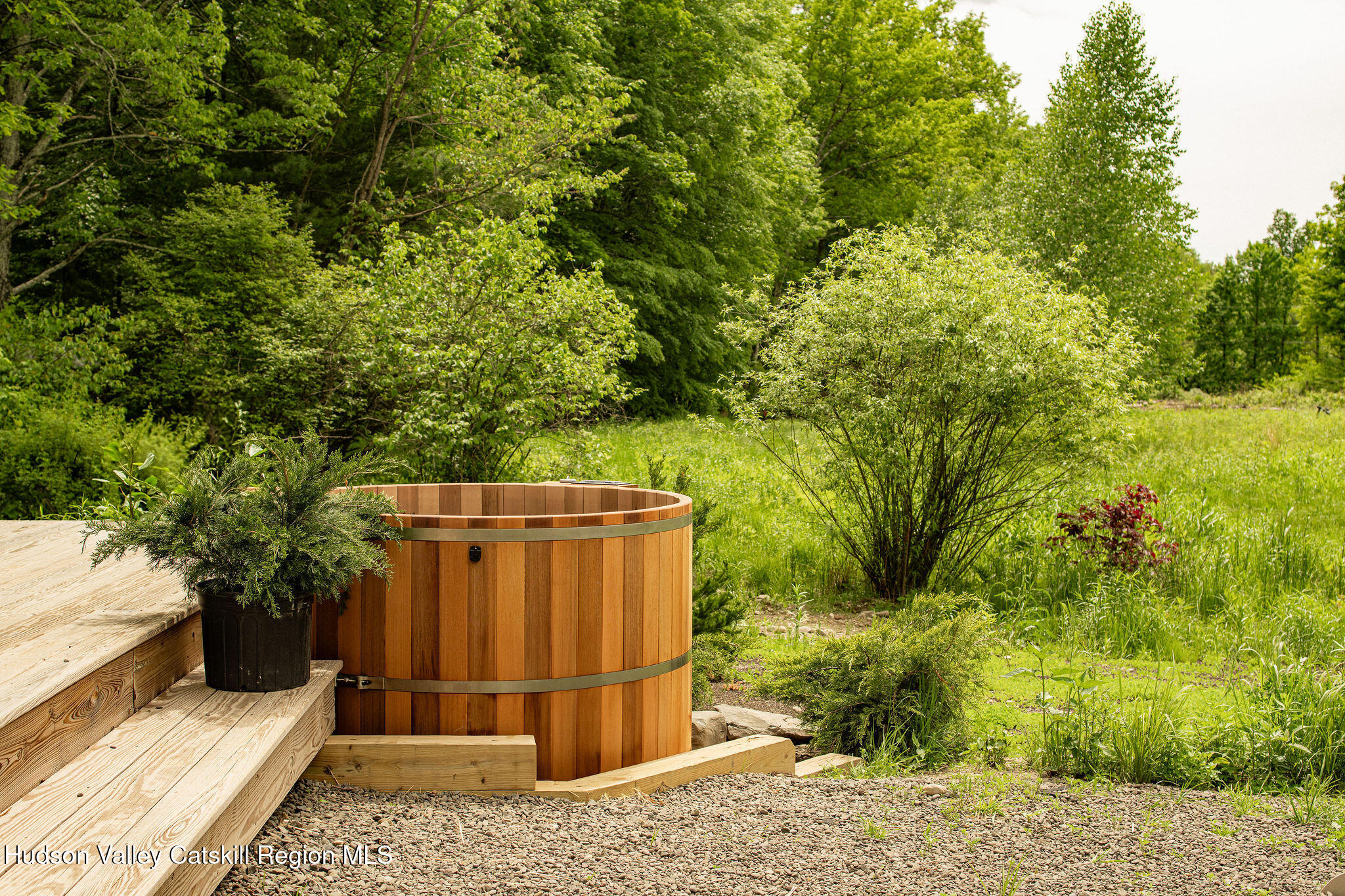 129 Krum Road Kerhonkson, NY 12446 - Photo 22 of 42 a view of a wooden door and trees in the background