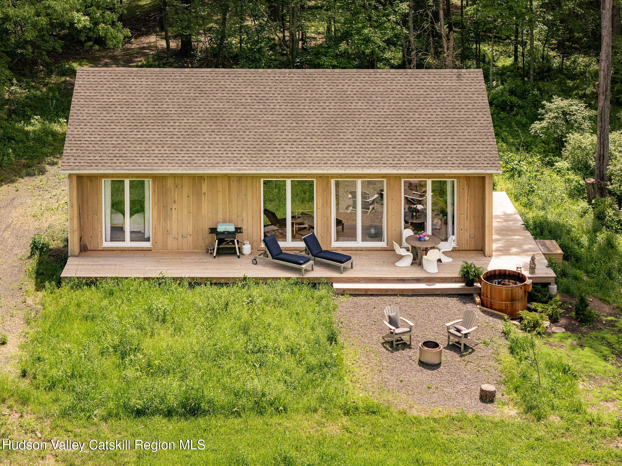 129 Krum Road Kerhonkson, NY 12446 - Photo 26 of 42 a view of house with yard outdoor seating and entertaining space