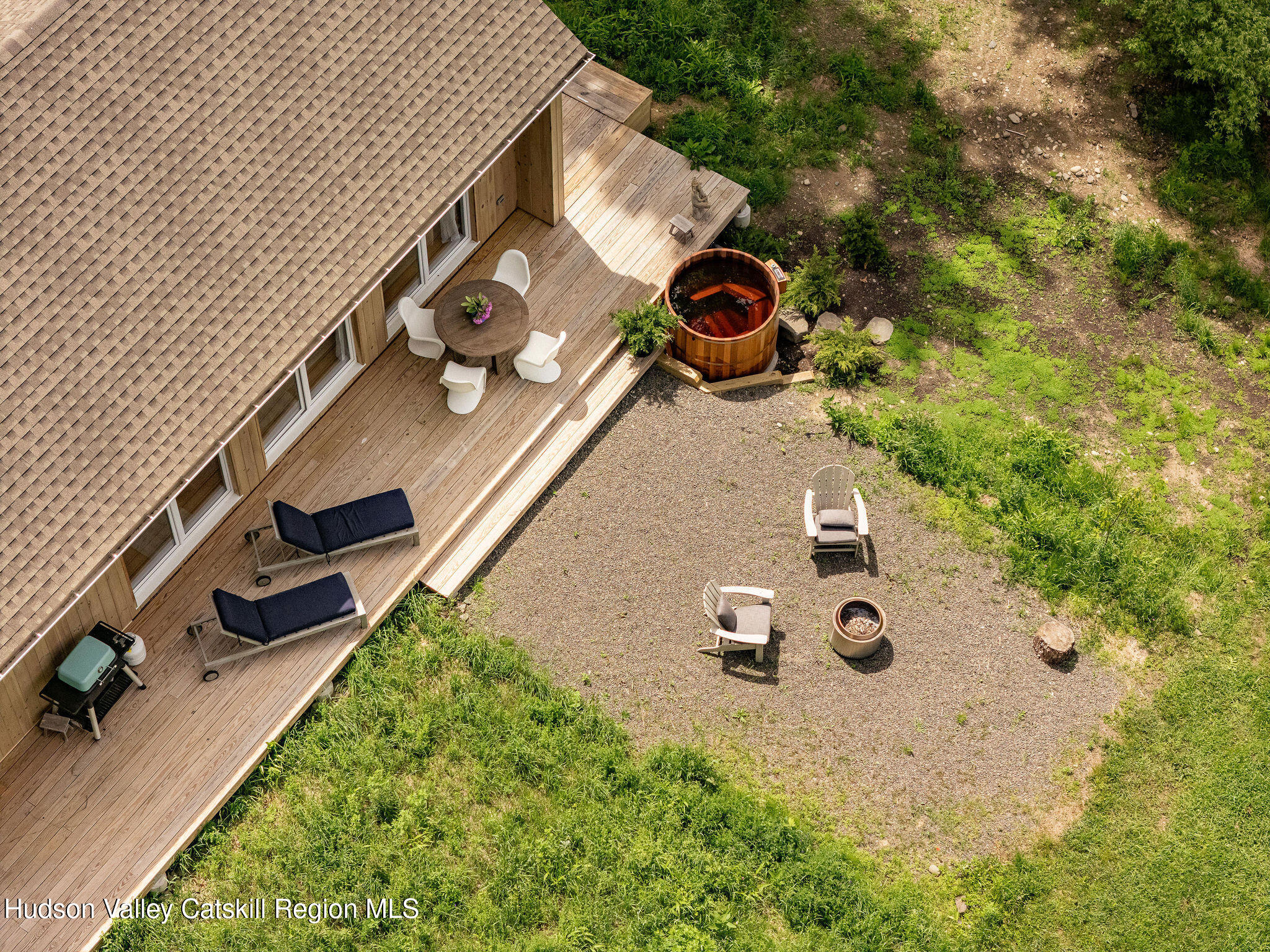 129 Krum Road Kerhonkson, NY 12446 - Photo 27 of 42 an aerial view of a backyard with a table and chairs
