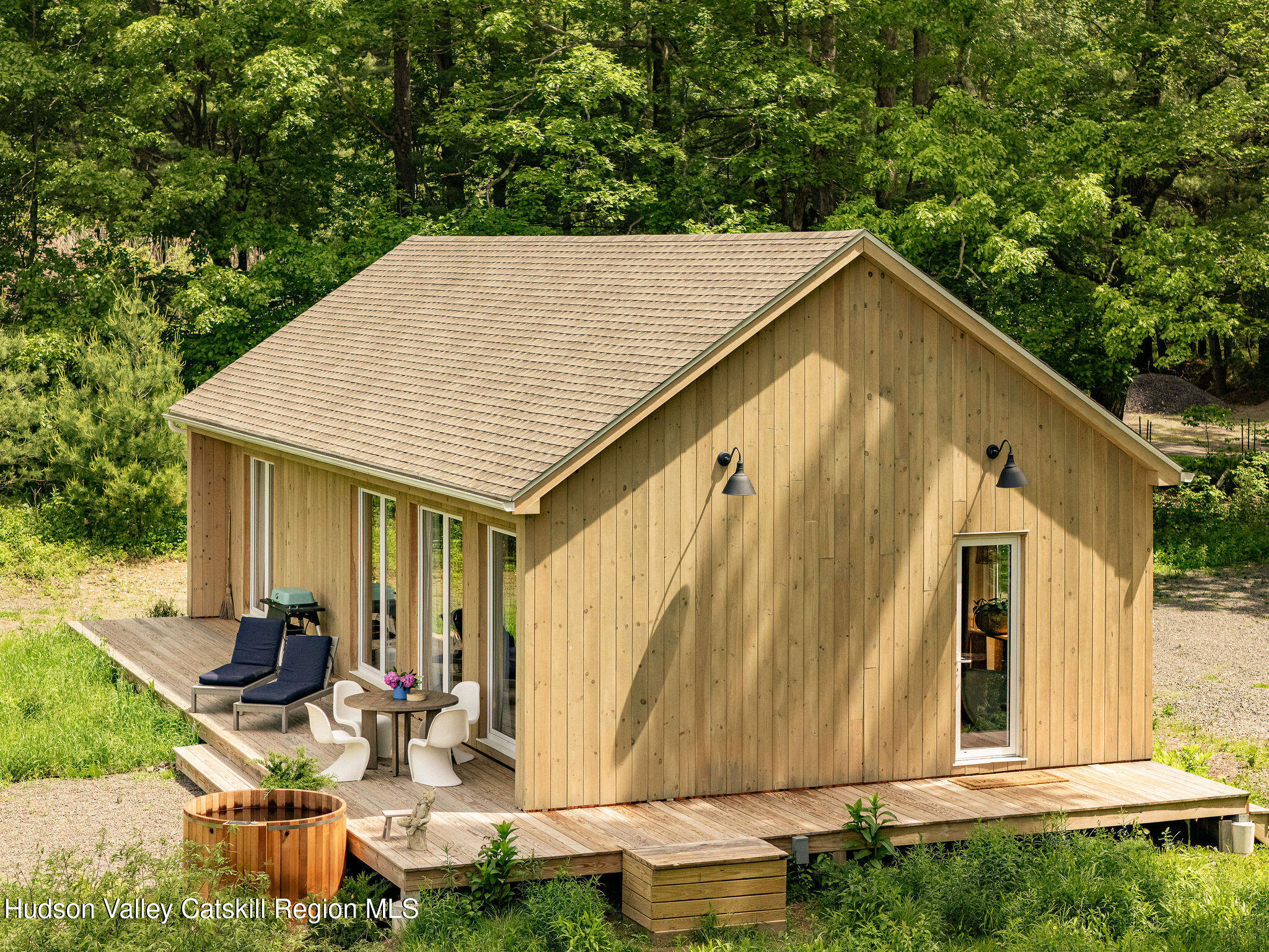 129 Krum Road Kerhonkson, NY 12446 - Photo 34 of 42 a backyard of a house with seating space