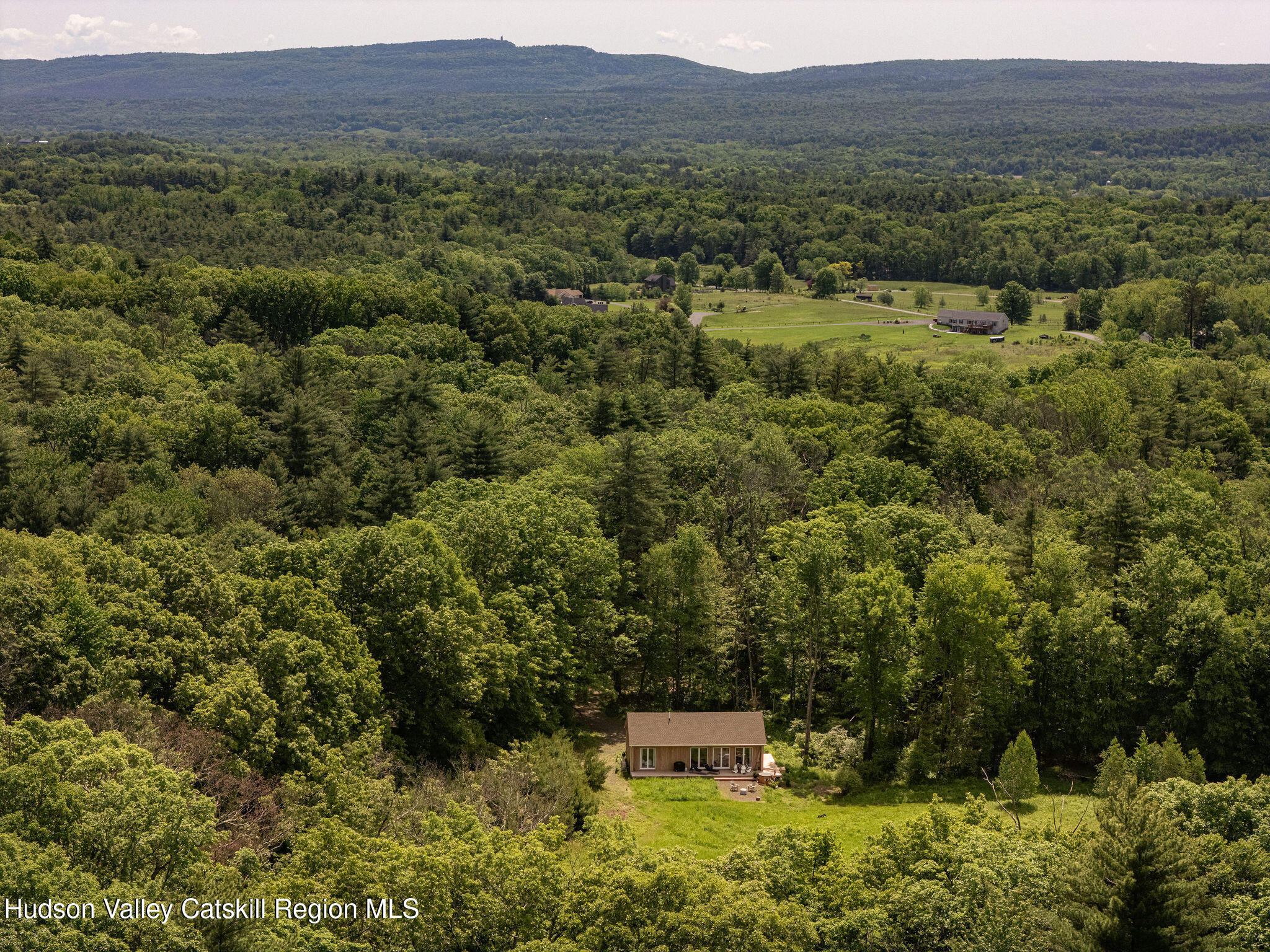 129 Krum Road Kerhonkson, NY 12446 - Photo 39 of 42 a view of a lush green hillside and houses