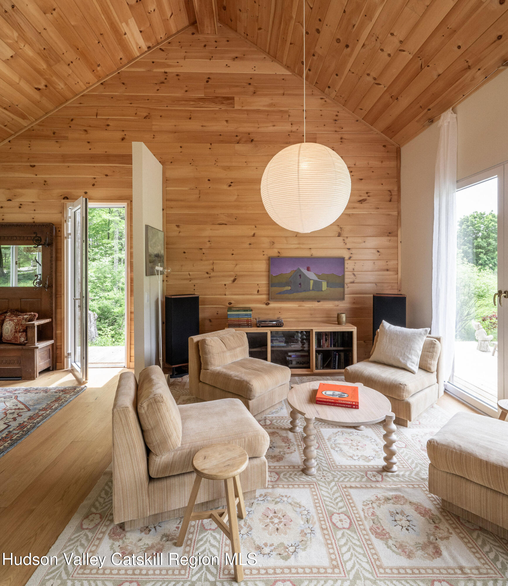 129 Krum Road Kerhonkson, NY 12446 - Photo 4 of 42 a living room with furniture a fireplace and a large window