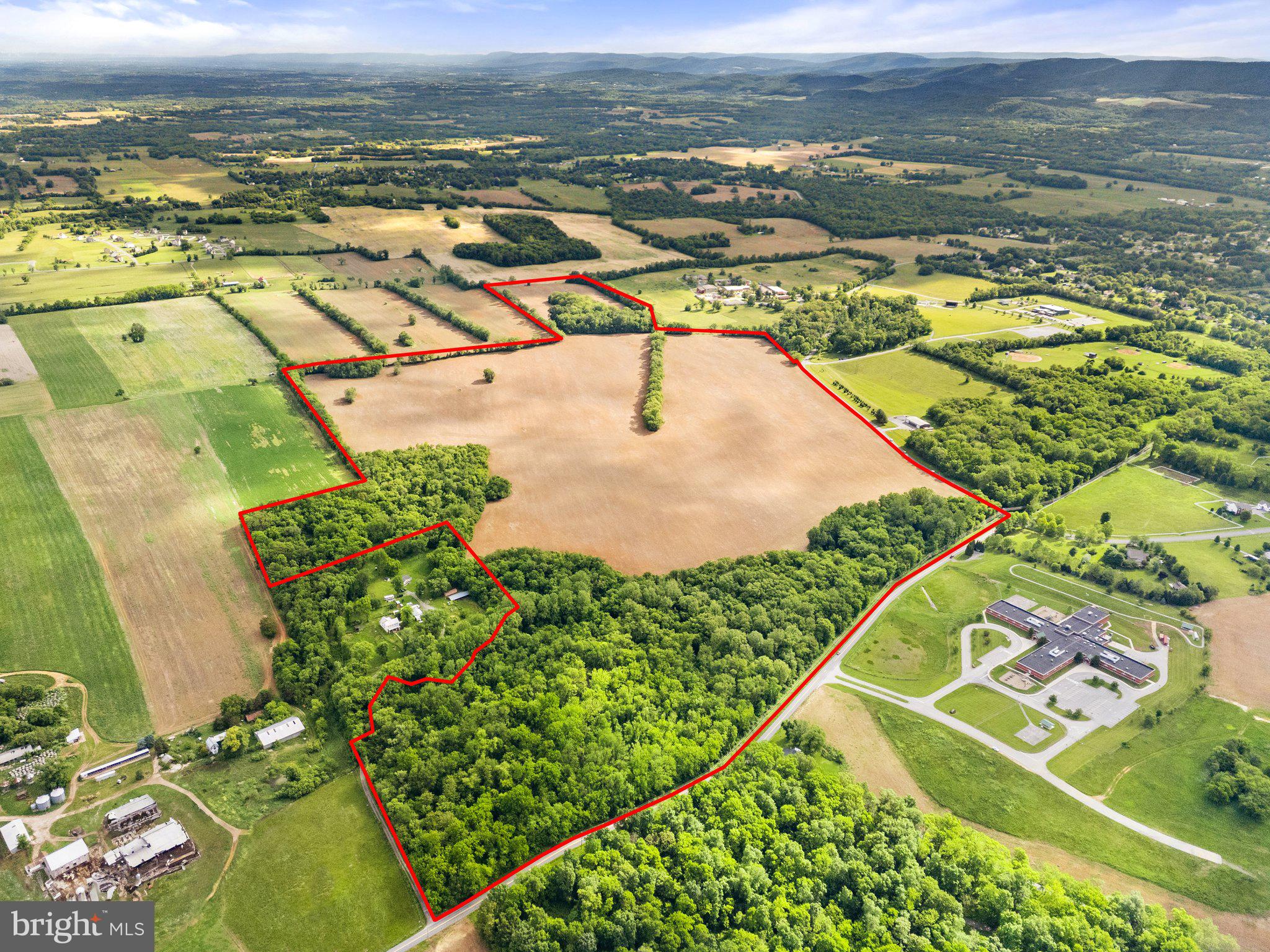Job Corps Road Shenandoah Junction, WV 25442 - Photo 1 of 18 an aerial view of residential houses with outdoor space