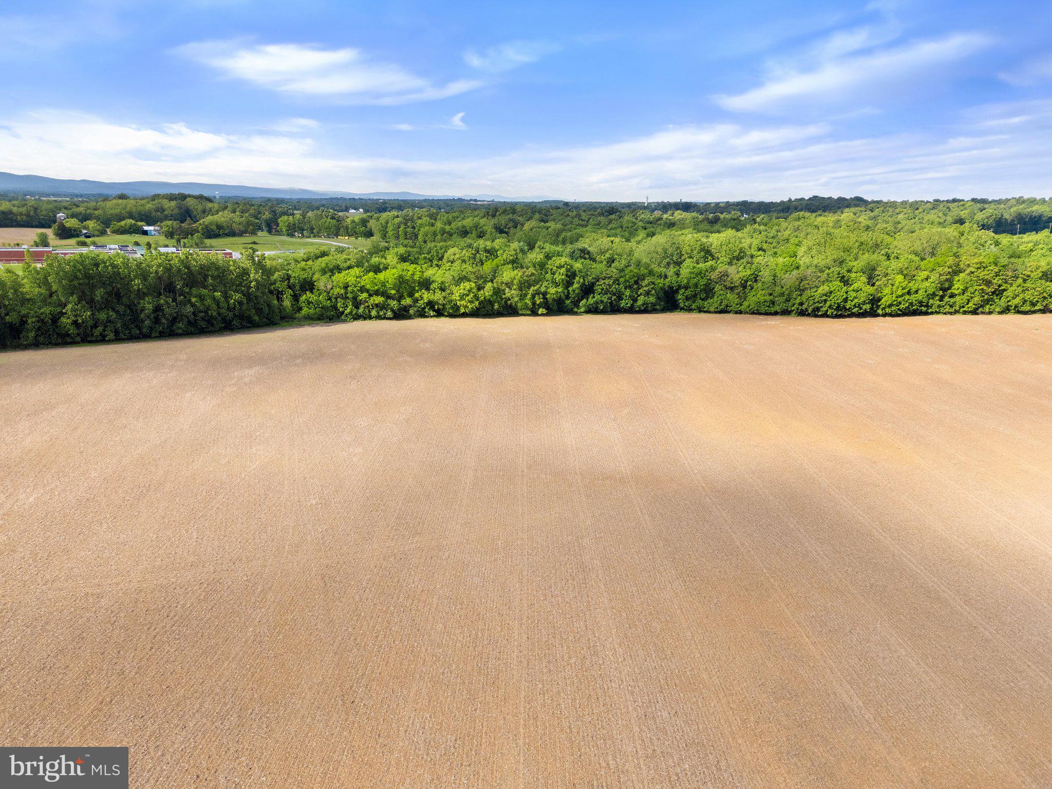 Job Corps Road Shenandoah Junction, WV 25442 - Photo 18 of 18 a view of a field with an ocean view
