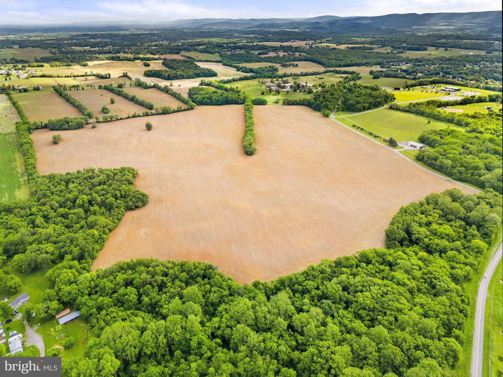 Job Corps Road Shenandoah Junction, WV 25442 - Photo 3 of 18 an aerial view of residential houses with outdoor space and river