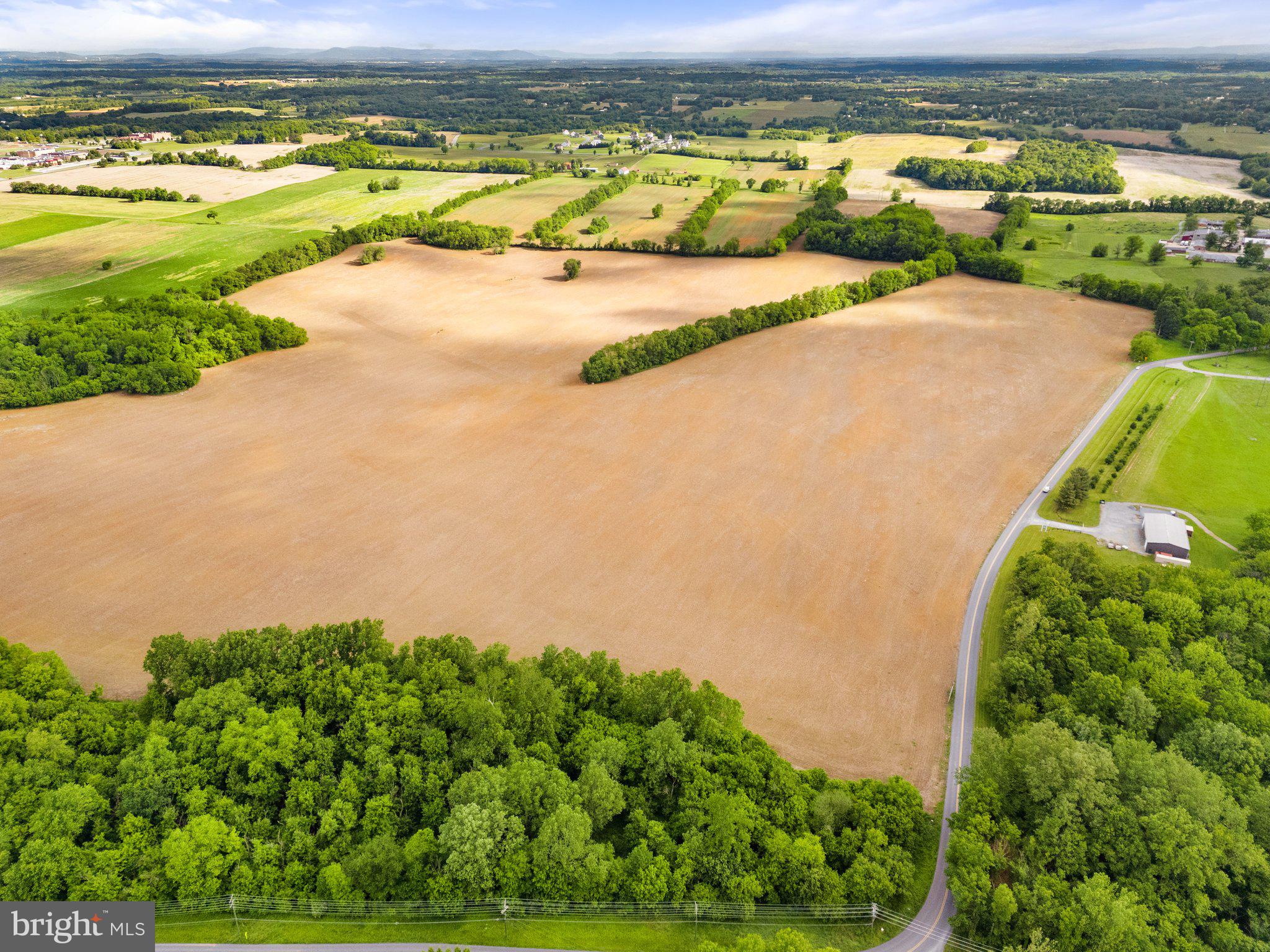 Job Corps Road Shenandoah Junction, WV 25442 - Photo 4 of 18 a view of a swimming pool and an outdoor space