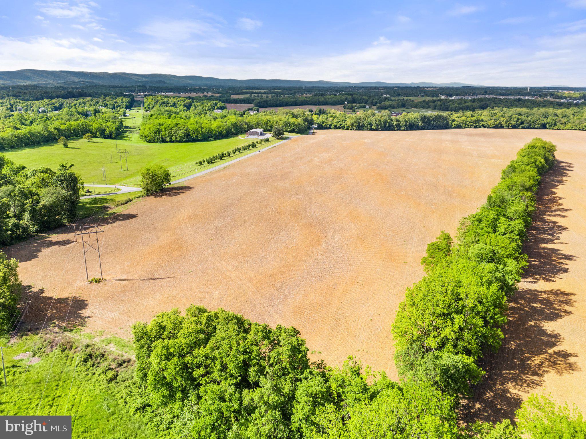 Job Corps Road Shenandoah Junction, WV 25442 - Photo 9 of 18 a view of a lake with a big yard