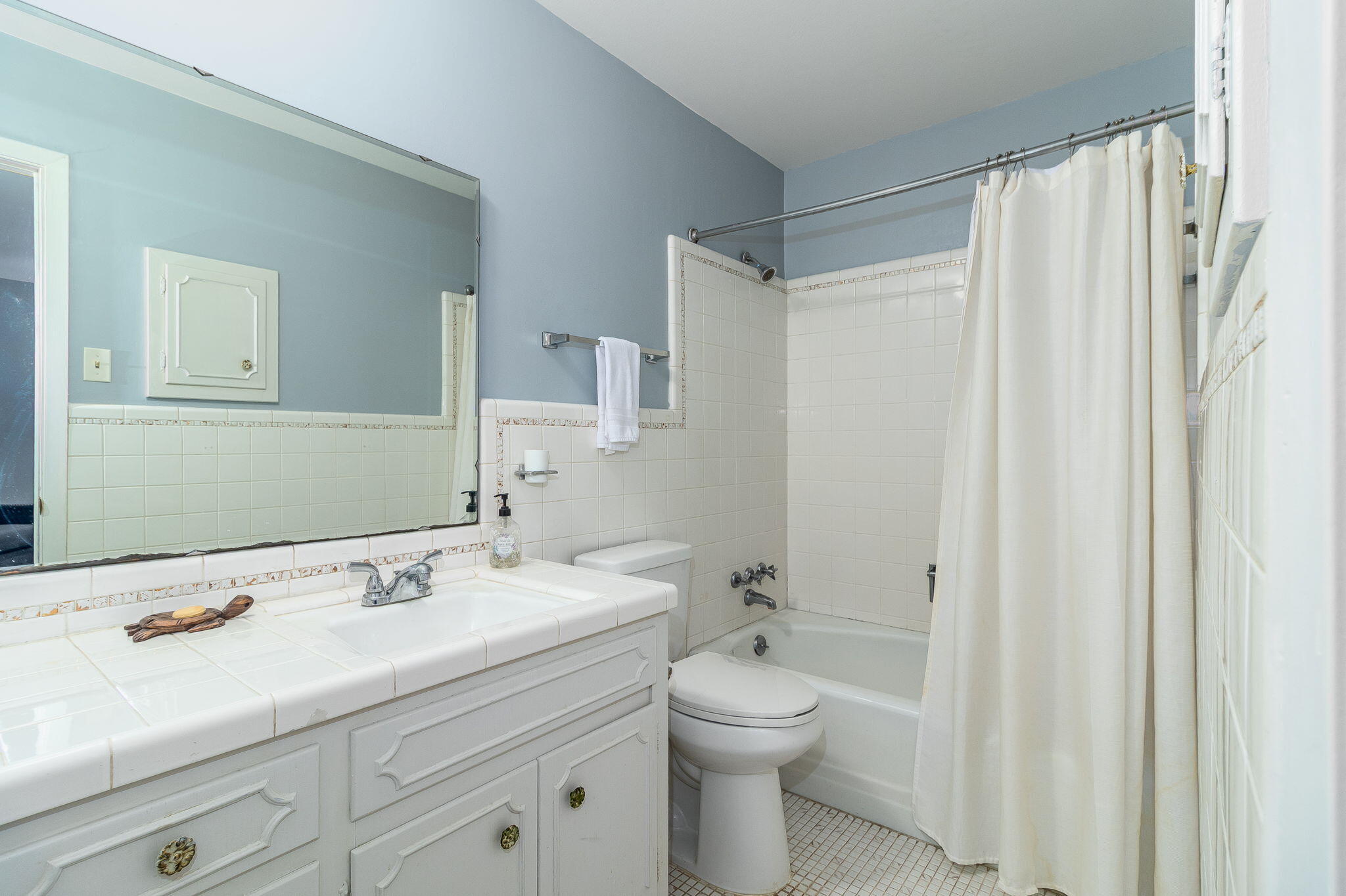 3129 Ramsgate Road Augusta, GA 30909 - Photo 35 of 55 White tile primary bathroom
