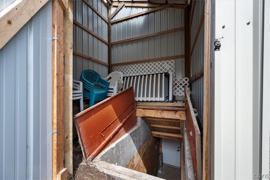 6126 Lowell Road Westmoreland, NY 13440 - Photo 39 of 45 Basement access beneath the backyard pavilion – on
