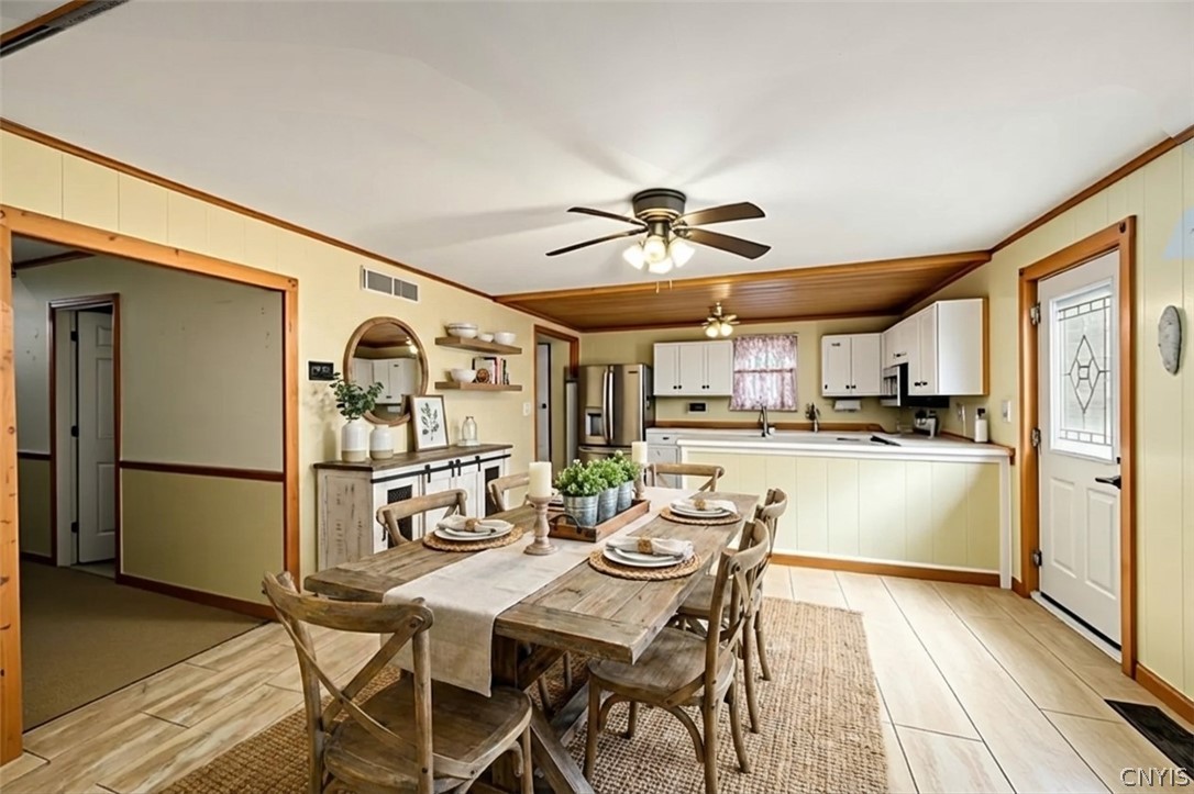 6126 Lowell Road Westmoreland, NY 13440 - Photo 10 of 45 Main home dining area *Virtually Staged*