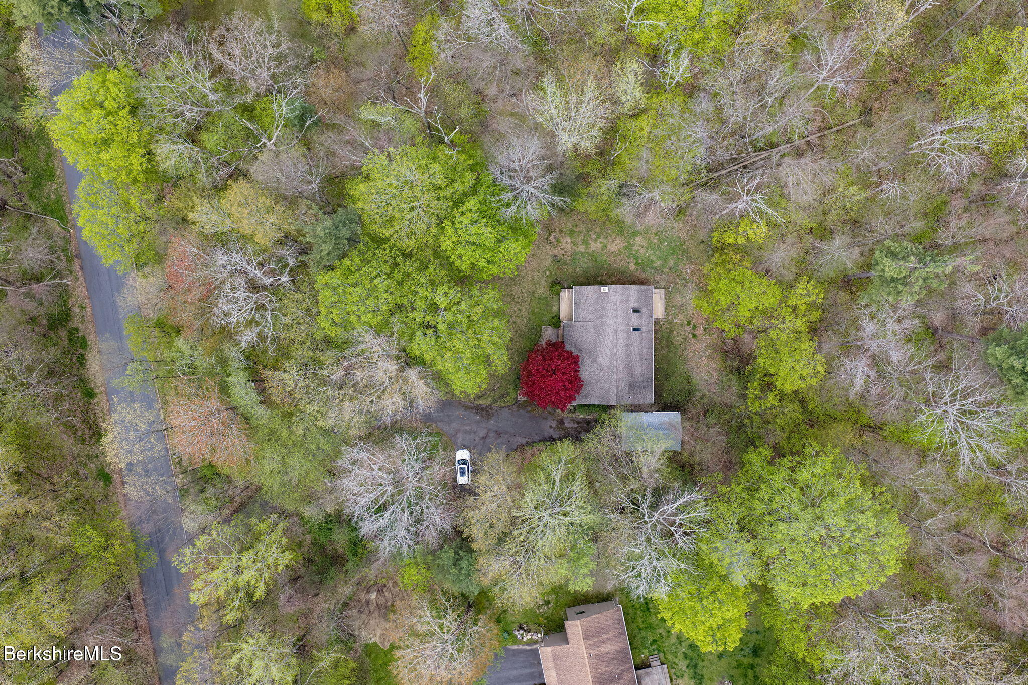 1874 Home Road Sheffield, MA 01230 - Photo 8 of 42 a backyard of a house with a yard and outdoor seating