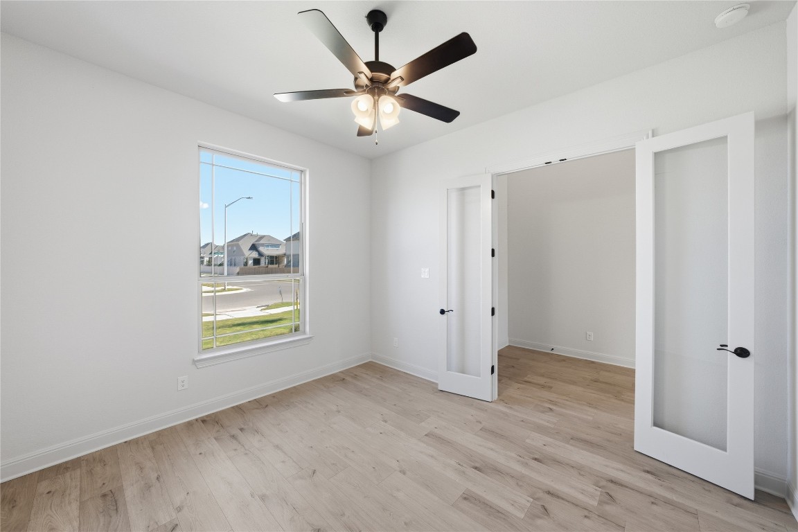 933 Sunny Ridge Drive Leander, TX 78641 - Photo 3 of 16 a view of an empty room and window
