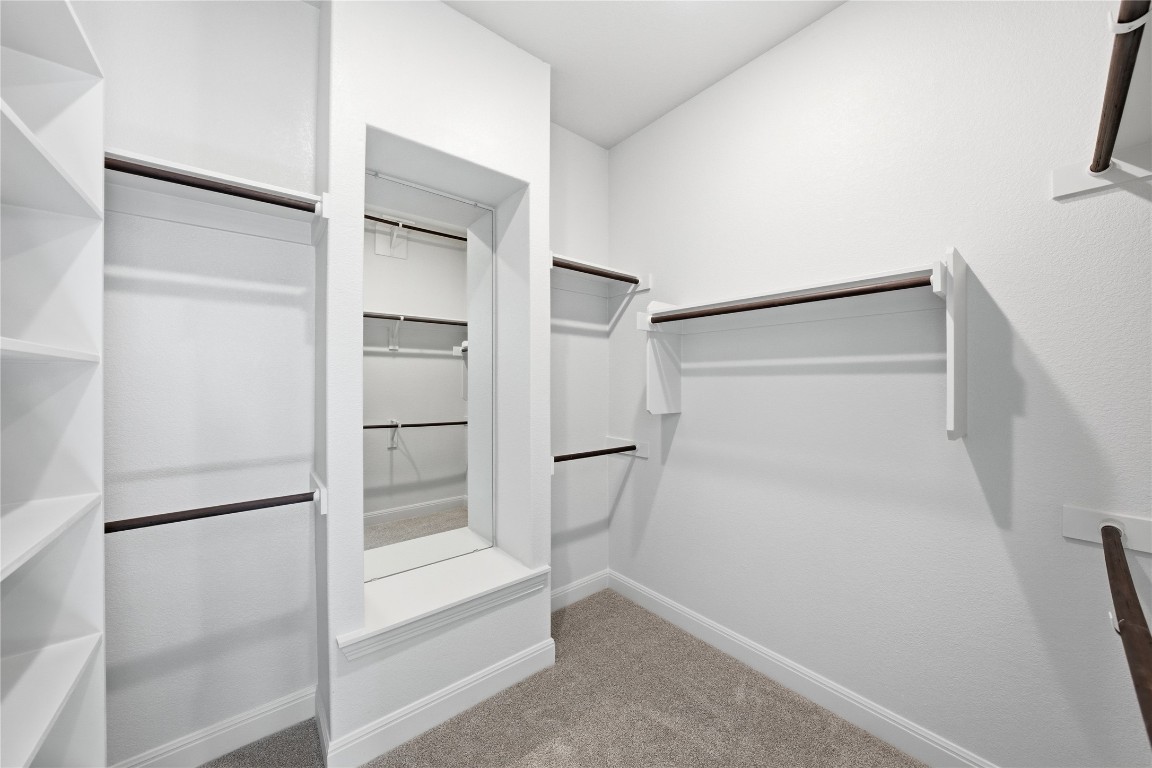 933 Sunny Ridge Drive Leander, TX 78641 - Photo 9 of 16 a view of an empty walk in closet