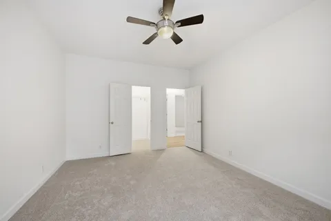 a view of a balcony with wooden floor