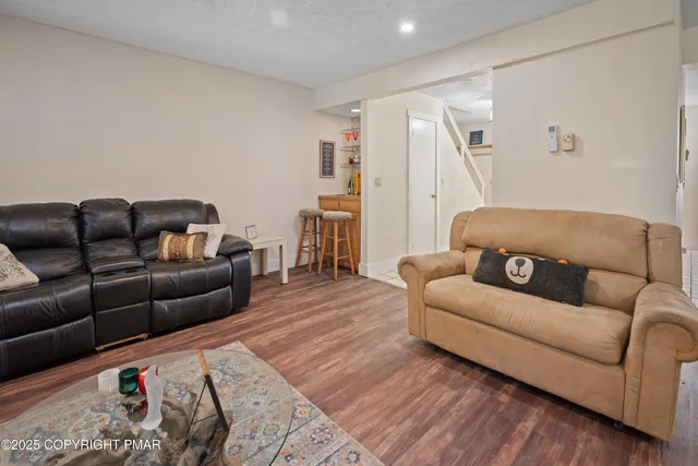 a living room with a couch and a couch