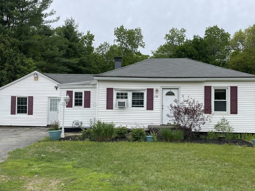 190 Turners Falls Road Montague, MA 01351 - Photo 25 of 35 a front view of house with yard and green space