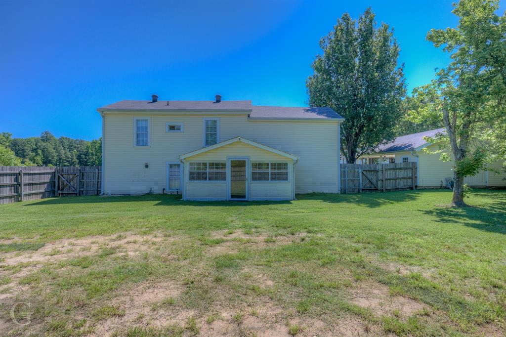 198 Main Street Doyline, LA 71023 - Photo 22 of 26 a view of a house with a yard