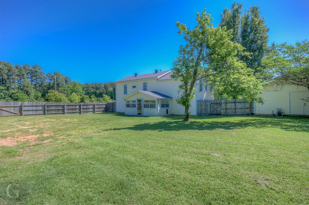 198 Main Street Doyline, LA 71023 - Photo 24 of 26 a view of a house with a yard