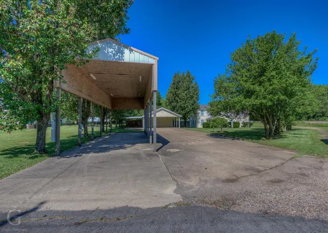 a view of outdoor space and yard