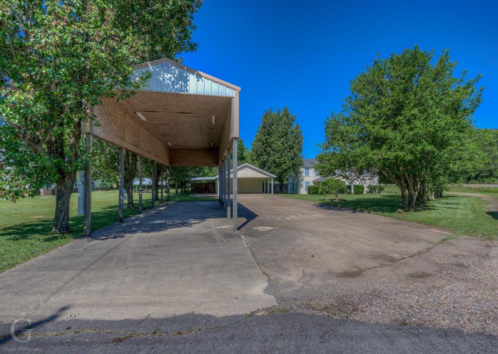 198 Main Street Doyline, LA 71023 - Photo 25 of 26 a view of backyard with green space