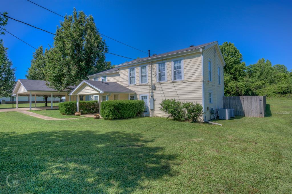 198 Main Street Doyline, LA 71023 - Photo 3 of 26 a house view with a garden space