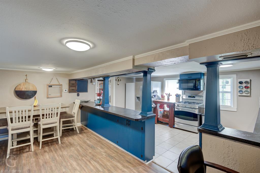 198 Main Street Doyline, LA 71023 - Photo 7 of 26 a view of a dining room with furniture and wooden floor
