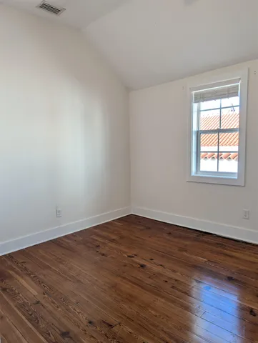 a kitchen with stainless steel appliances granite countertop a refrigerator microwave and stove