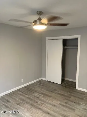 a view of a livingroom with wooden floor