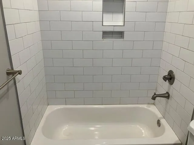 a bathroom with a bathtub